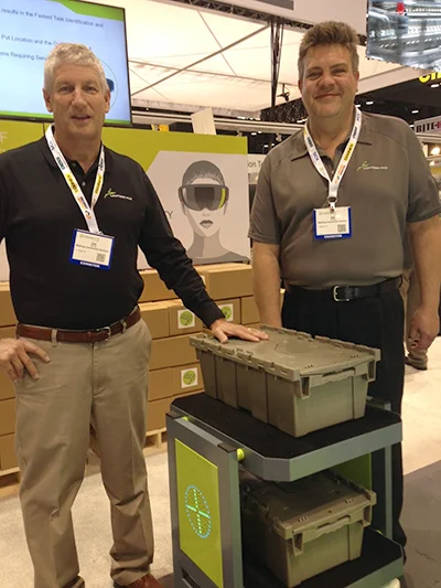 lightning pick employees at trade show with autonomous mobile robot