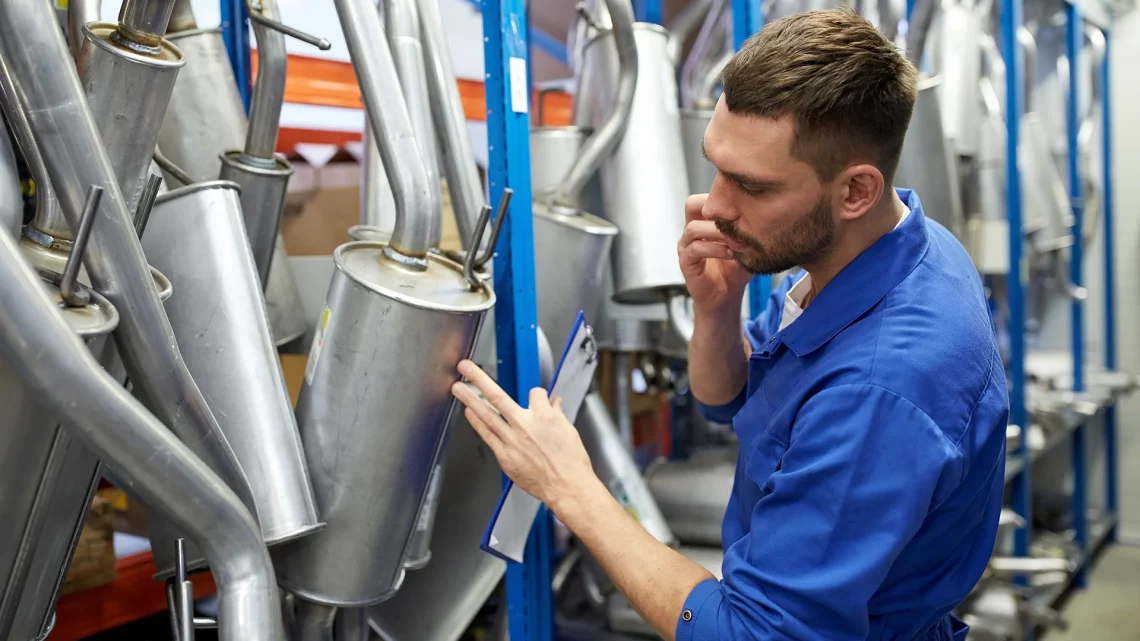 worker in automotive distribution warehouse