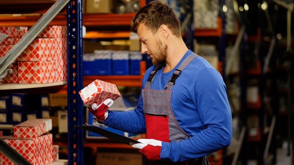 Man taking inventory in warehouse